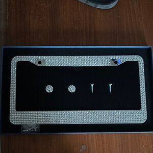 Crystallized license plate holder Brand new.